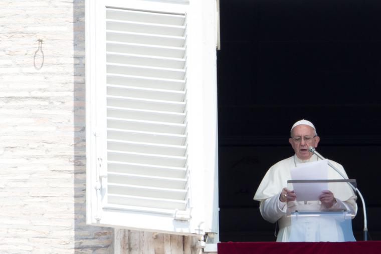 Pope Francis prays the Regina Coeli for Pentecost Sunday in St. Peter's Basilica on May 20, 2018.