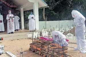 A funeral service during the height of the coronavirus pandemic in Kerala.
