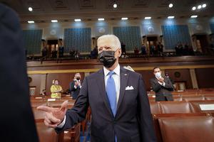 President Joe Biden prepares to deliver an address to a joint session of Congress at the U.S. Capitol April 28 in Washington, D.C.