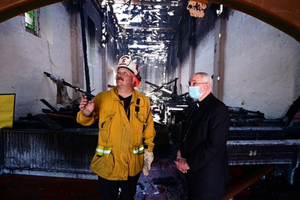Archbishop Jose Gomez of Los Angeles visits the scene of the fire at San Gabriel mission, July 11, 2020