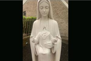 A statue of Mary and the Infant Jesus was found outside the diocesan administrative offices in Brooklyn.