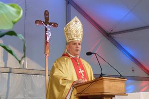 Archbishop Samuel J. Aquila celebrates Mass for the 20th anniversary of the 1993 Denver World Youth Day on August 15, 2013.
