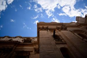 A view of St. Peter’s Basilica shows the façade and the sky.