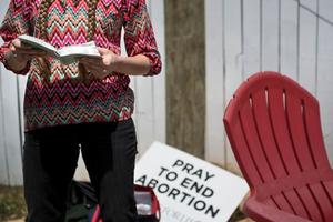 A pro-lifer prays outside the Jackson Women's Health Organization April 5, 2018, in Jackson, Mississippi. On May 17, 2021, the U.S. Supreme Court agreed to take up the Mississippi ban on abortions after 15 weeks of pregnancy.
