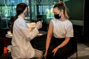 A student receives a COVID-19 vaccine at a vaccination clinic on the University of Washington campus on May 18 in Seattle.