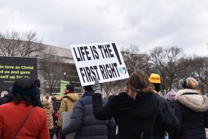 Organizers and a limited number of participants march in the 48th-annual March for Life in Washington on Jan. 29, in a scaled-down event due to the coronavirus pandemic.