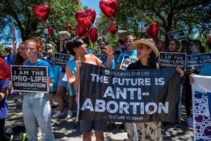 Pro-life group Students for Life members stand near the gate of the Texas Capitol May 29 in Austin, Texas, just after Gov. Greg Abbott signed a fetal heartbeat bill.