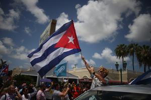 Cuban exiles rally at Versailles Restaurant in Miami's Little Havana in support of protesters in Cuba.
