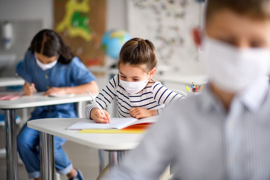 Children wearing masks during the 2020 school year.