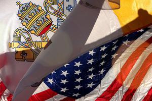 The U.S. flag and the flag of Vatican City fly outside Nationals Park before Pope Benedict XVI’s visit to Washington, DC, April 15, 2008.