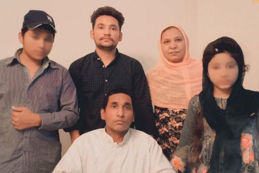 Shagufta Kausar and Shafqat Emmanuel with three of their children after being released from death row in Pakistan July 1, 2021