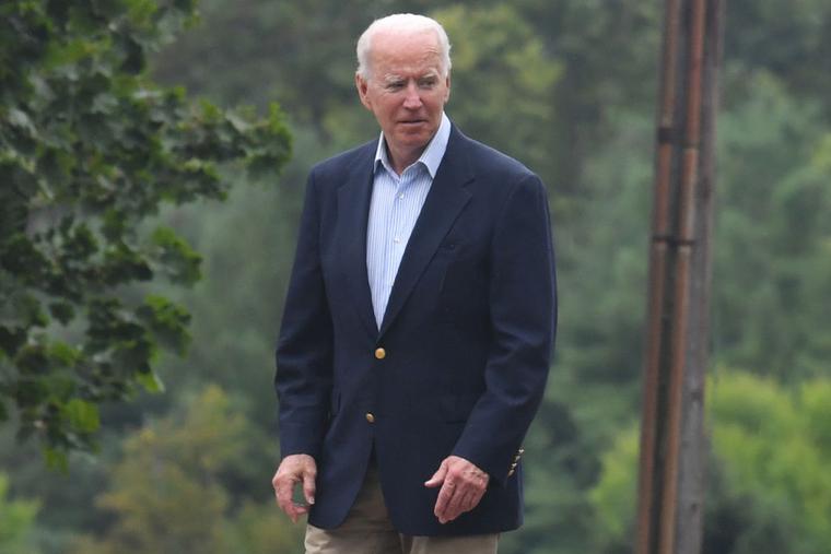 President Joe Biden returns to his car after attending service at  Saint Joseph's Cathlic Church in Wilmington, Delaware on August 7, 2021.