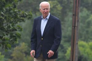 President Joe Biden returns to his car after attending service at  Saint Joseph's Cathlic Church in Wilmington, Delaware on August 7, 2021.