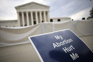 Anti-abortion activists demonstrate outside the U.S. Supreme Court building Monday in Washington, DC.