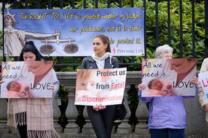 Pro life protesters outsider the Belfast High court with signs, as Northern Ireland abortion laws are being challenged.Belfast, UK. October 3, 2019