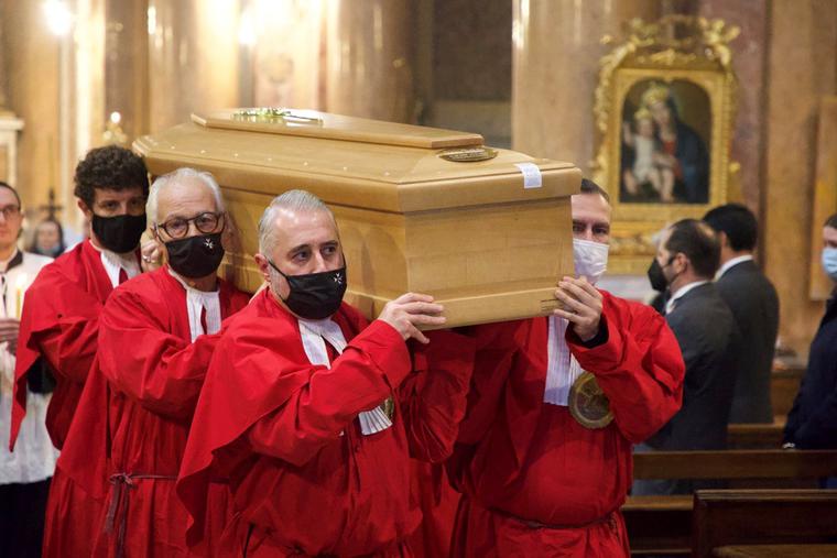 Pallbearers carry the casket of Gaetano Tinnirello during the funeral procession Nov. 18, 2021 inside Santissima Trinità dei Pellegrini (Most Holy Trinity of the Pilgrims) in Rome.