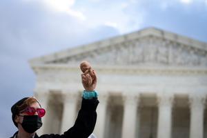 A pro-life demonstrator protests outside the U.S. Supreme Court on Nov. 1 in Washington, D.C.