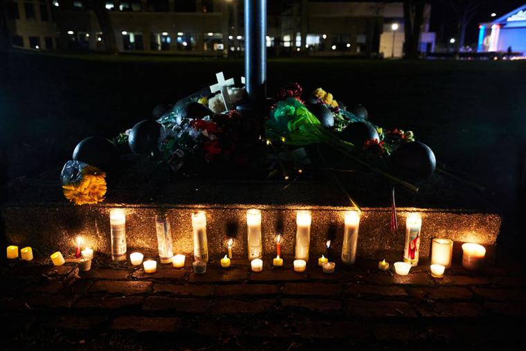 A makeshift memorial is pictured in Cutler Park in Waukesha, Wisconsin on November 22, 2021, the day after a vehicle drove through a Christmas parade killing five people.