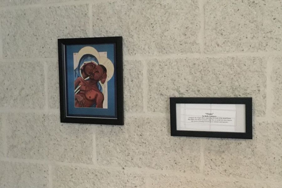 A Pieta painting, "Mama," by artist Kelly Latimore, has been displayed outside the law school chapel at The Catholic University of America since February 2021. It was stolen on Nov. 23, 2021.