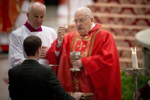 Cardinal Angelo Sodano distributes Holy Communion during the "Pro Eligendo Pontifice" Mass, or the Mass for the election of a new pope, in St. Peter's Basilica on March 12, 2013, before entering the Sistine Chapel for the papal conclave.