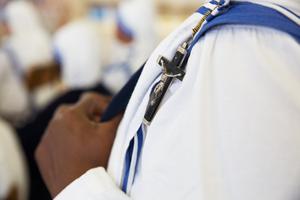 A Missionary of Charity listens to a talk in Rome on Sept. 16, 2017, by Father Tom Uzhunnalil, the Salesian missionary who had been kidnapped in 2016 from a Missionaries of Charity home in Aden.