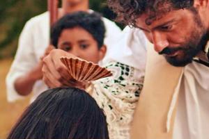 A scene from ‘St. Francis Xavier: To the Ends of the Earth’ portrays the saint baptizing new believers in the 16th century.