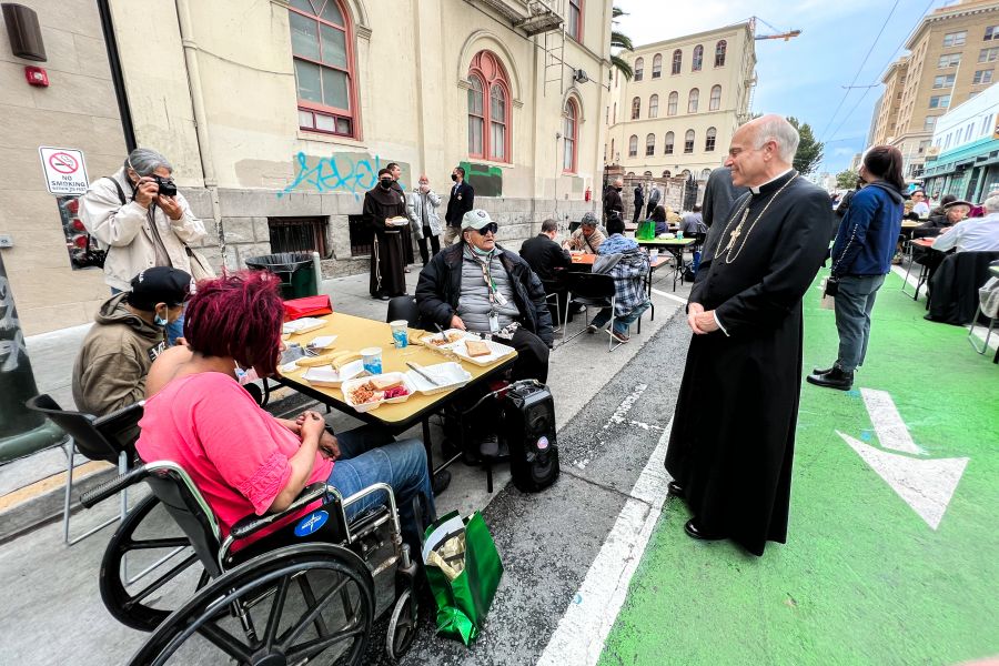 Archbishop Salvatore Cordileone meets with people experiencing homeless at St. Anthony’s Dining Hall in San Francisco's Tenderloin neighborhood on November 6, 2021.