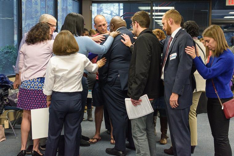 Laying of Hands and Prayer Photo