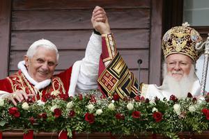 Pope Benedict XVI and Ecumencial Orthodox Patriarch Bartholomew I raise their clasped hands at the balcony of the Patriarcal Church of St. George, Nov. 30, 2006, in Istanbul.
