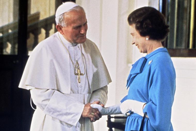 Pope John Paul II shakes hands with Queen Elizabeth II as he leaves Buckingham Palace after their historic May 28, 1982, meeting in London.