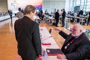Bishop Georg Batzing (L), Chairman of the German Bishops' Conference and Cardinal Reinhard Marx (R) talk during the final day of the "Synadoler Weg" Catholic Reform Movement Congress on February 05, 2022 in Frankfurt, Germany.