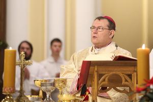 Archbishop Paolo Pezzi, the president of the Catholic bishops' conference of Russia, celebrates Christmas Eve Mass at the Cathedral of the Immaculate Conception, in Moscow.