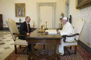 Russian president Vladimir Putin with Pope Francis in Vatican City, during a papal audience with Pope Francis on June 10, 2015. The discussion between President Putin and Pope Francis focused on the crises in both Ukraine and the Middle East.