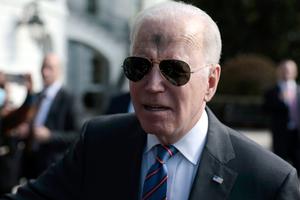 President Joe Biden, with ashes on his forehead in honor of Ash Wednesday, speaks to reporters before boarding Marine One with first lady Jill Biden on the South Lawn of the White House on March 2 in Washington, D.C.