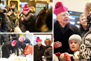 Archbishop Marek Jędraszewski of Krakow greets hundreds of Ukrainians as they arrive by train seeking refuge.