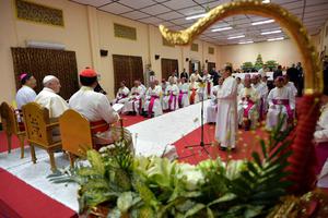 Pope Francis meets with the bishops of Myanmar, also known as Burma, Nov. 29, 2017 in Yangon. Mandalay Archbishop Marco Win Tin and more than a dozen priests were placed under house arrest Friday by government forces.