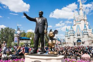 A Walt Disney statue stands in the Magic Kingdom theme park at Walt Disney World in Orlando, Florida