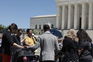 Pro-lifers pray in front of the U.S. Supreme Court Building on May 10 in Washington.