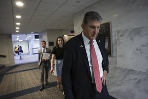 U.S. Sen. Joe Manchin, D-W. Va., walks after a vote on the Women’s Health Protection Act, at the Hart Senate Office Building, on May 11 in Washington. Manchin voted No on the measure, resulting in the Democrats failing to advance the bill that would codify abortion rights at the federal level. U.S. Sen. Joe Manchin, D-W. Va., walks after a vote on the Women’s Health Protection Act, at the Hart Senate Office Building, on May 11 in Washington. Manchin voted No on the measure, resulting in the Democrats failing to advance the bill that would codify abortion rights at the federal level.