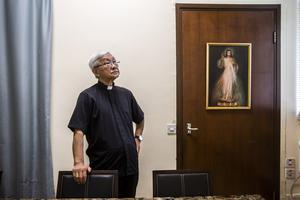 In this picture taken on Sept. 11, 2020, Cardinal Joseph Zen, former bishop of Hong Kong, poses for a photo at his residence during an interview with AFP in Hong Kong. He was arrested and released on bail last week.