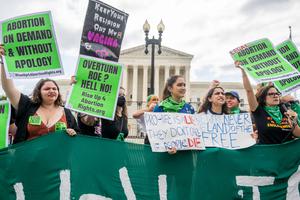 Pro-abortion activists react to the Dobbs v. Jackson Women's Health Organization ruling in front of the U.S. Supreme Court on Friday in Washington, DC.