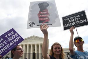 Pro-life supporters celebrate outside the US Supreme Court in Washington, DC, on June 24, 2022. Pro-life supporters celebrate outside the US Supreme Court in Washington, DC, on June 24, 2022.