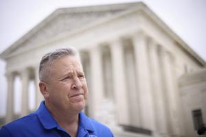 Former Bremerton High School assistant football coach Joe Kennedy answers questions after his legal case, Kennedy vs. Bremerton School District, was argued before the Supreme Court on April 25 in Washington, DC. Kennedy was terminated from his job by Bremerton public school officials in 2015 after refusing to stop his on-field prayers after football games.