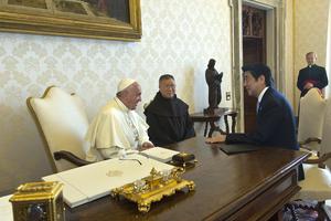 Pope Francis speaks with Japanese Prime Minister Shinzo Abe on June 6, 2014, in Vatican City, Vatican. The Pope sent his condolences on July 9, 2022, after Abe was assassinated.