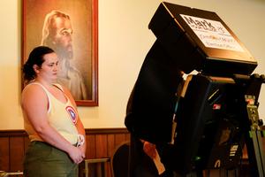 A poll worker helps a voter cast their ballot in the Kansas Primary Election at Merriam Christian Church on August 02, 2022 in Merriam, Kansas.