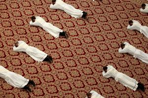 Priests lie prostrate during their ordination by Pope Francis during Mass in St. Peter Basilica on the 56th World Day of Prayer for Vocations on May 12, 2019.