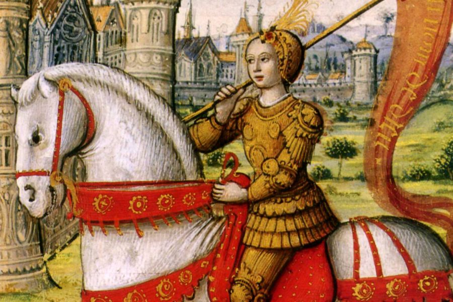 St. Joan of Arc is depicted on horseback in an illustration from a 1504 manuscript.