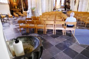 A bottle of hand gel is seen in a stoup of the Church of Our Lady (Lievenvrouwenkerk) on Aug. 2 in Sint-Truiden, Belgium. A bottle of hand gel is seen in a stoup of the Church of Our Lady (Lievenvrouwenkerk) on Aug. 2 in Sint-Truiden, Belgium.