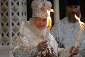 Russian Orthodox Patriarch Kirill lights candles during the Easter Mass at the Christ The Saviour Cathedral on April 24, 2022 in Moscow, Russia.