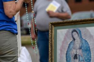 A pro-lifer prays the Rosary outside the Hope Clinic for Women abortion business in Granite City, Illinois, on June 25. A pro-lifer prays the Rosary outside the Hope Clinic for Women abortion business in Granite City, Illinois, on June 25.